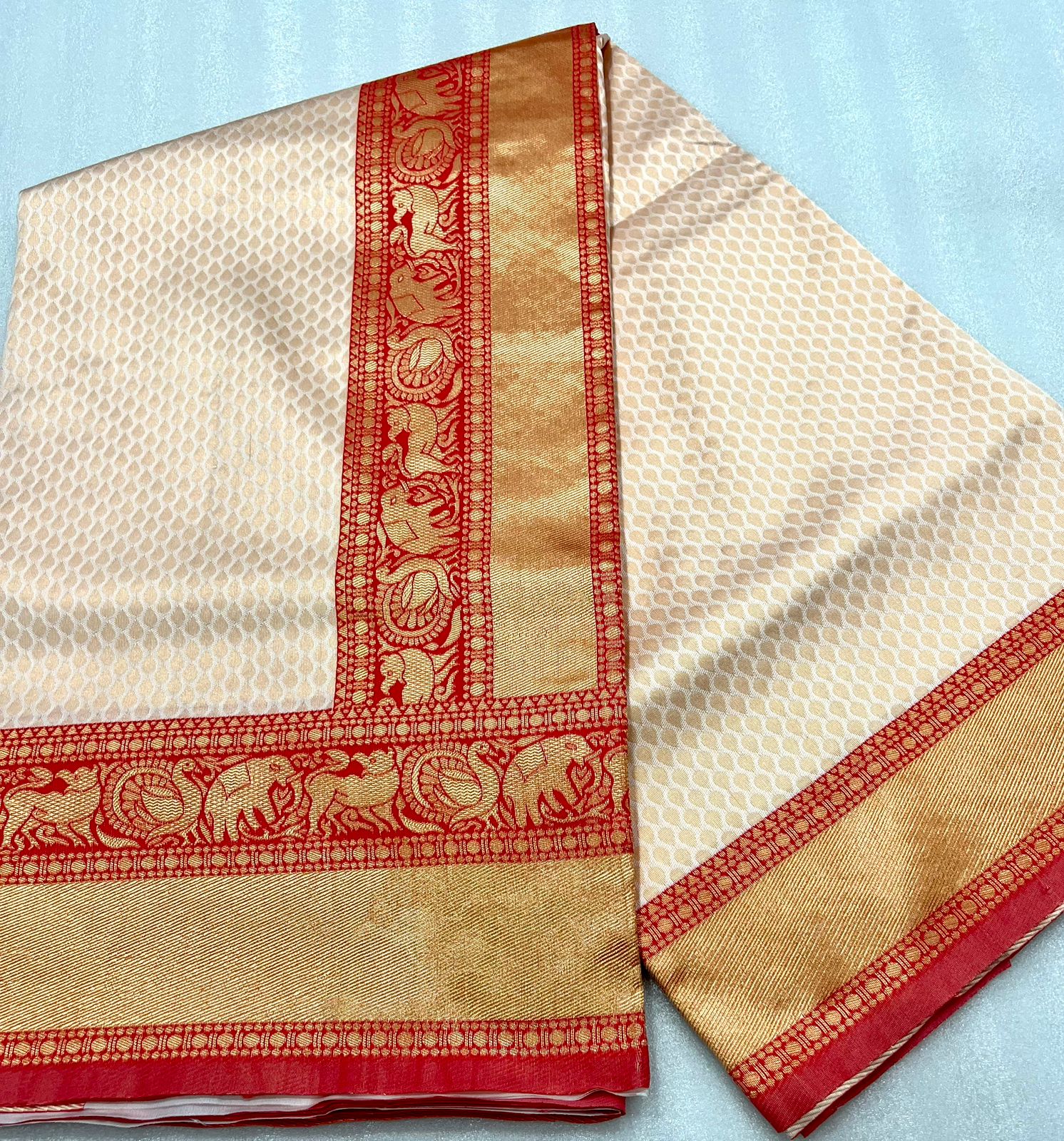 Mesmeric Cream Soft Banarasi Silk Saree With Blouse Piece