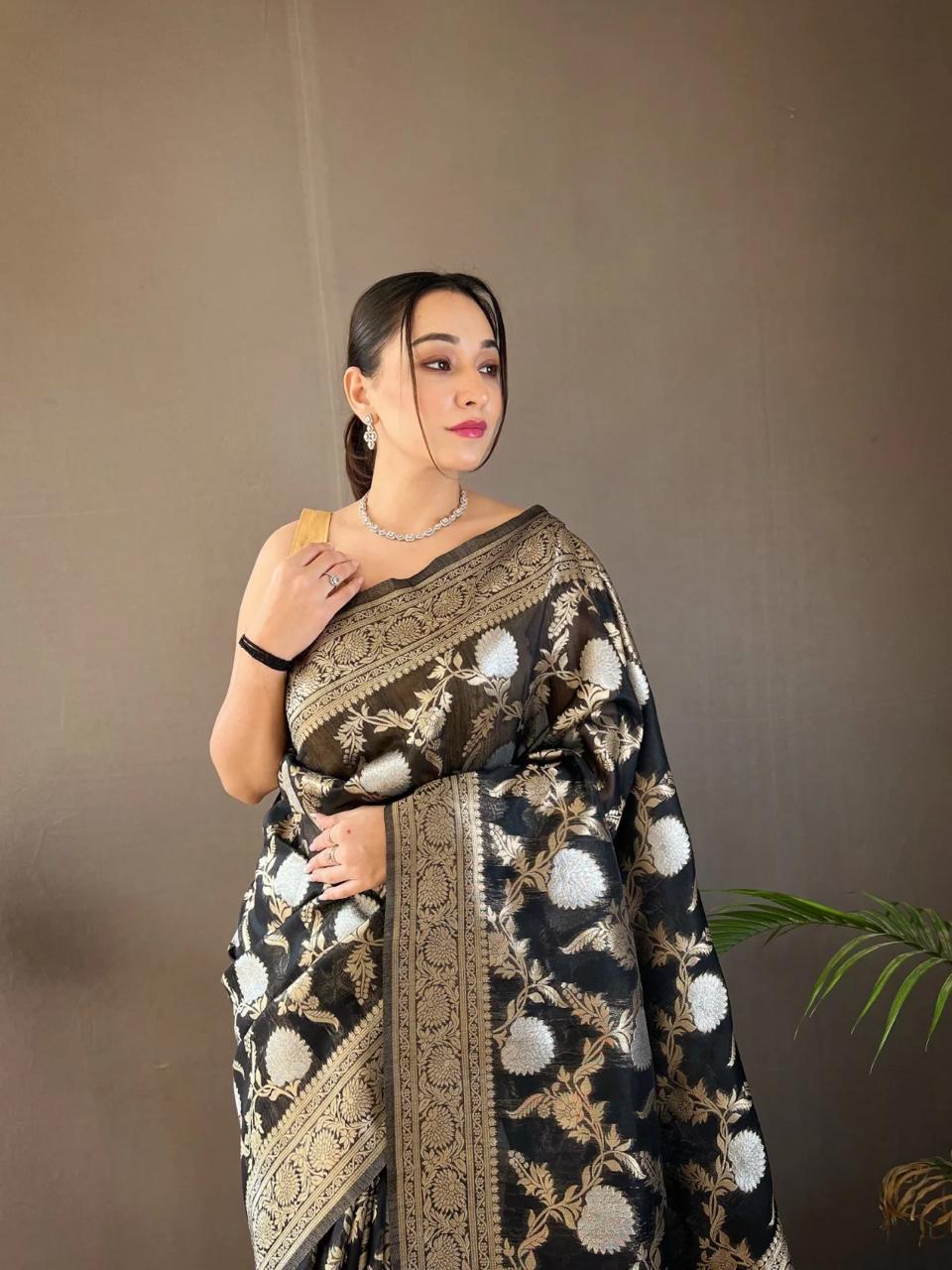 Adorning Black Soft Silk Saree With Blooming Blouse Piece