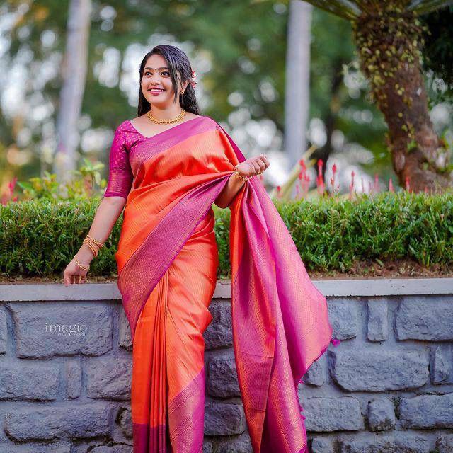 Beleaguer Orange Soft Silk Saree With Charming Blouse Piece