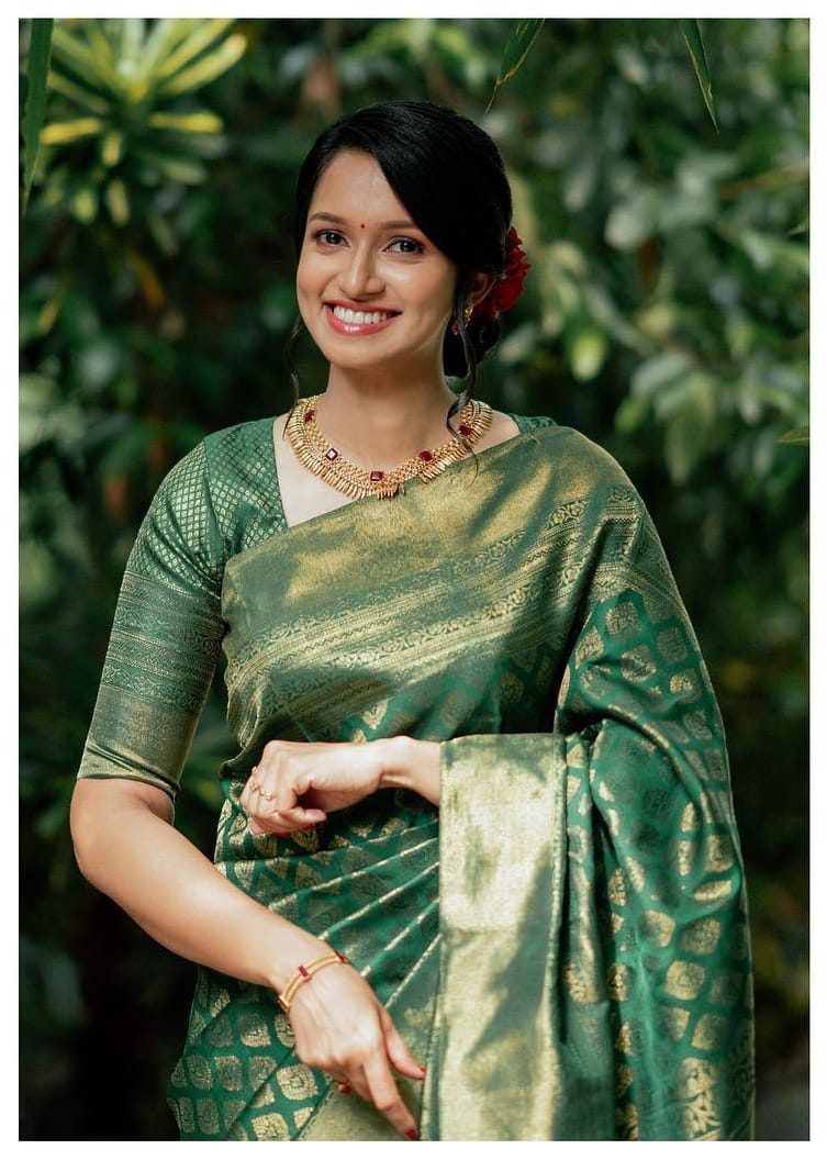 Tempting Green Soft Silk Saree With Blissful Blouse Piece