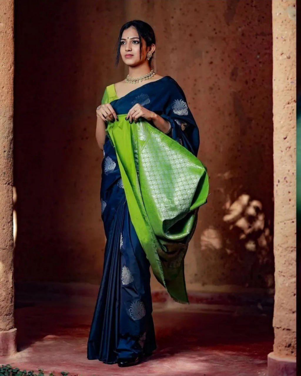 Adorning Blue Soft Silk Saree With Blooming Blouse Piece