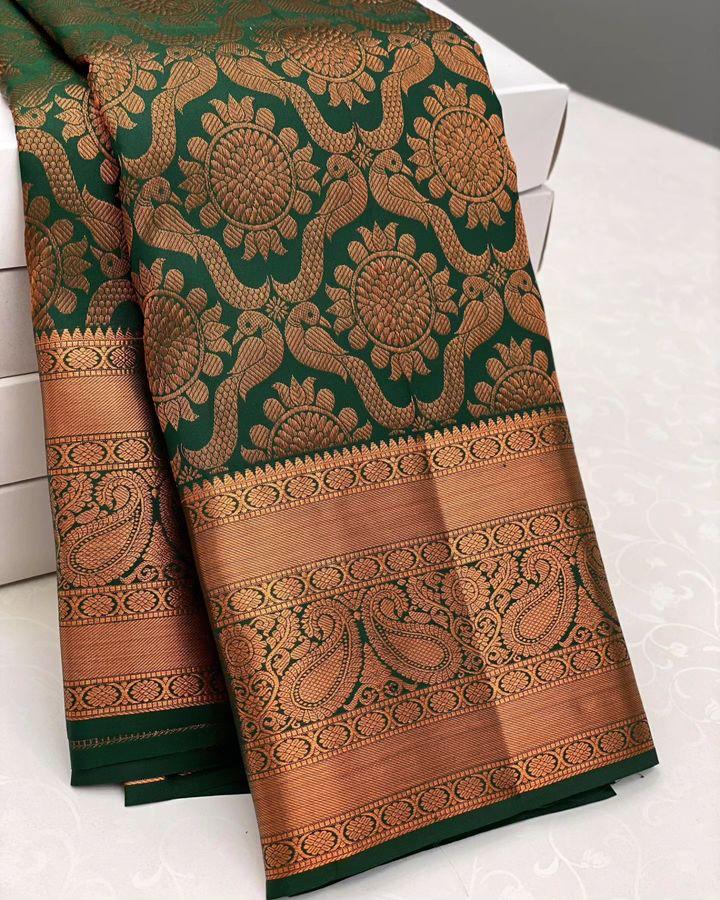 Opulent Green Soft Banarasi Silk Saree With ImbricationBlouse Piece