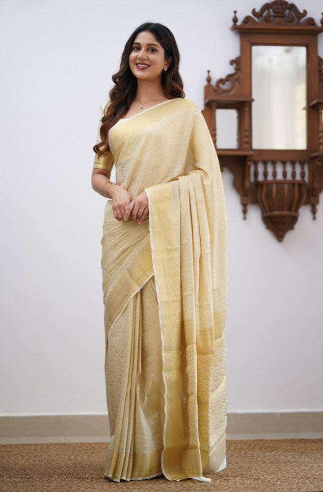 Ebullience Off White Color Soft Banarasi Silk Saree With Blouse Piece