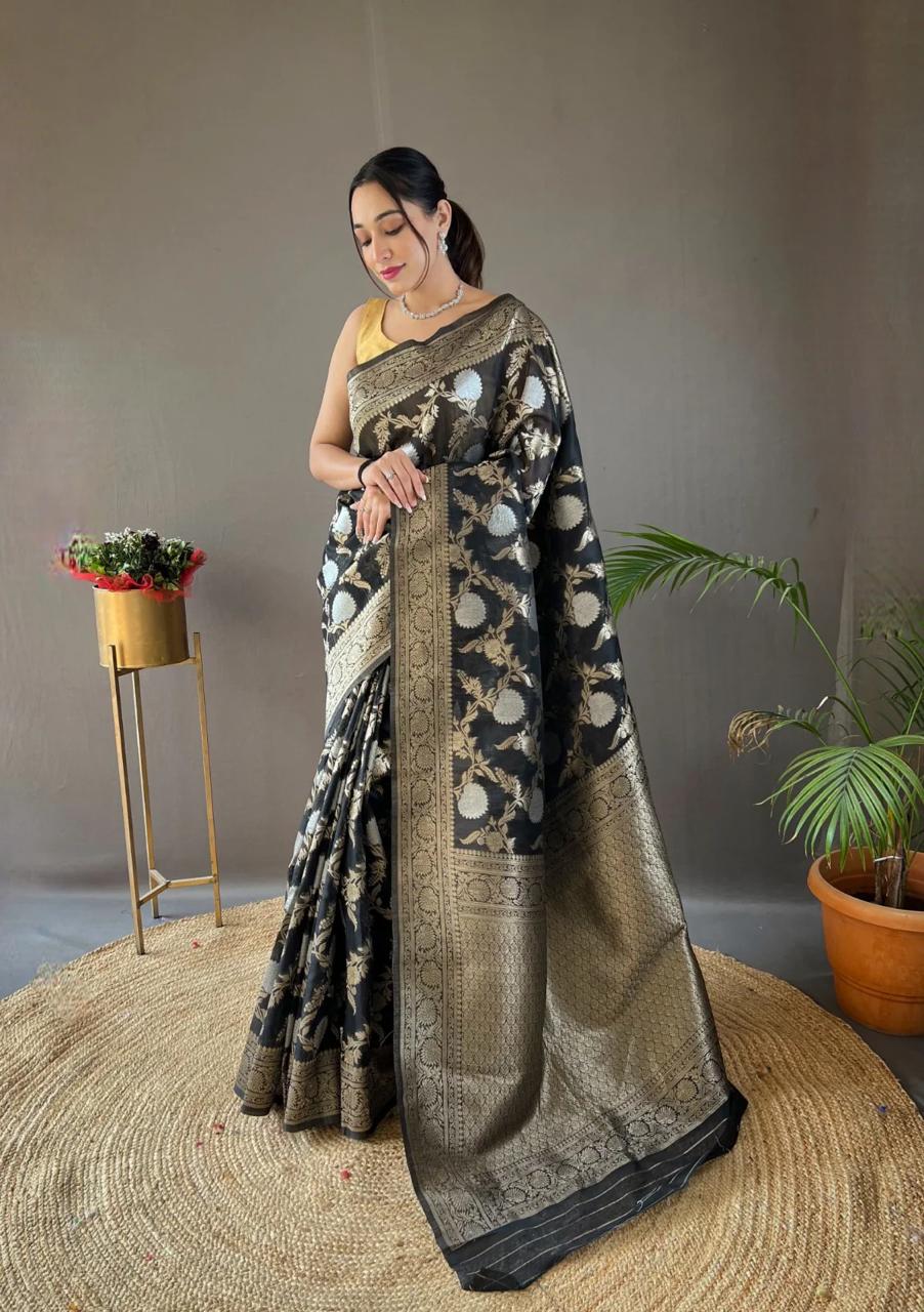 Adorning Black Soft Silk Saree With Blooming Blouse Piece