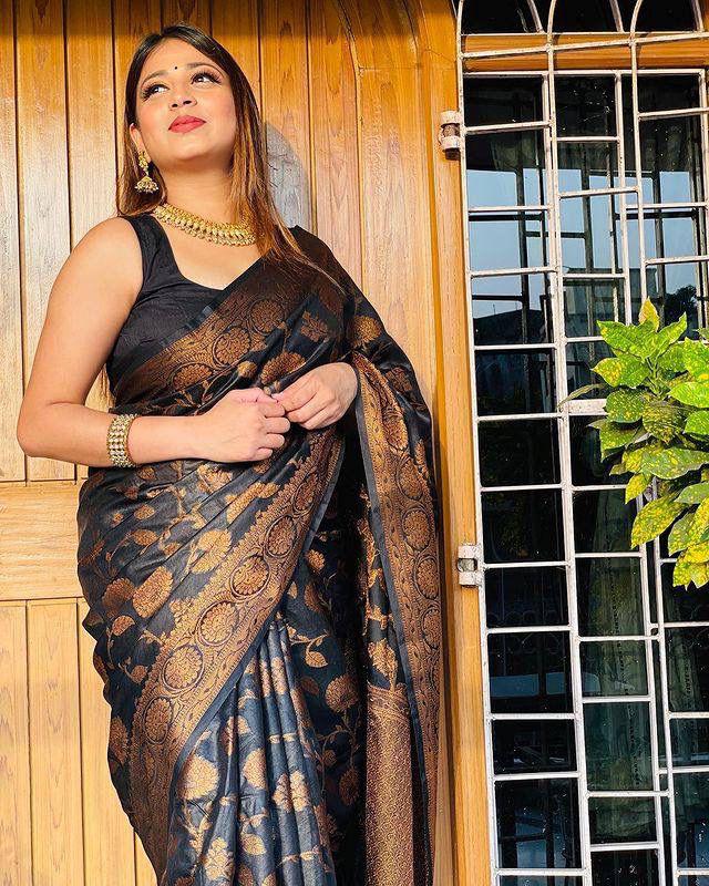 Devastating Black Soft Banarasi Silk Saree With Snazzy Blouse Piece