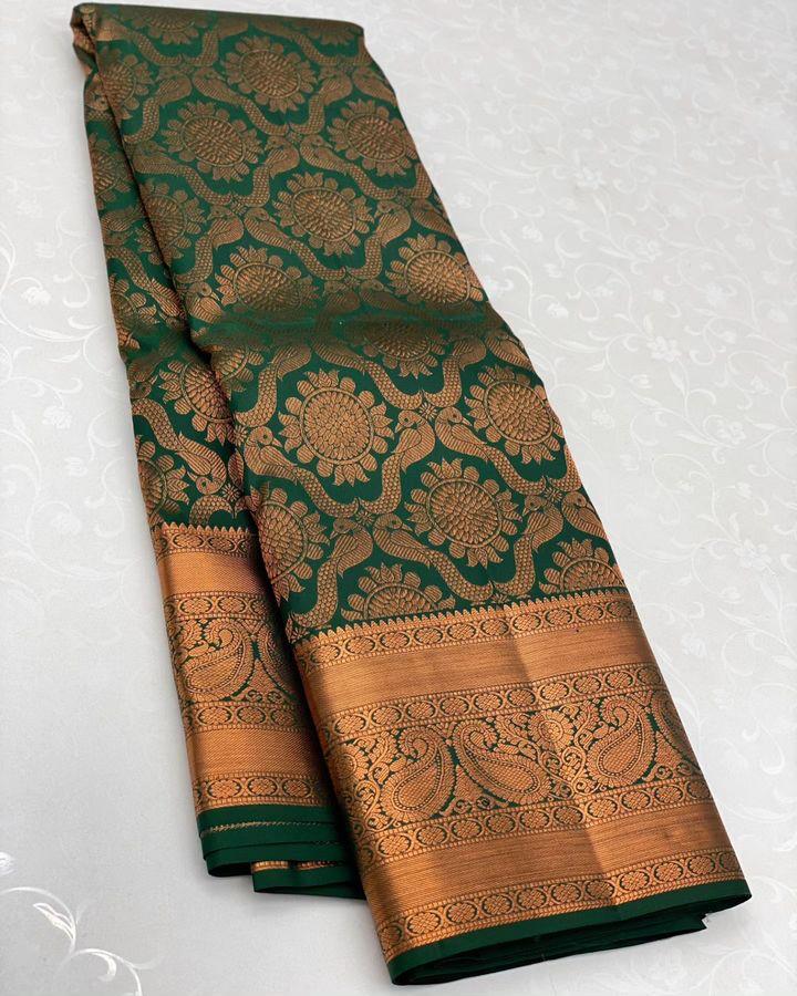 Opulent Green Soft Banarasi Silk Saree With ImbricationBlouse Piece