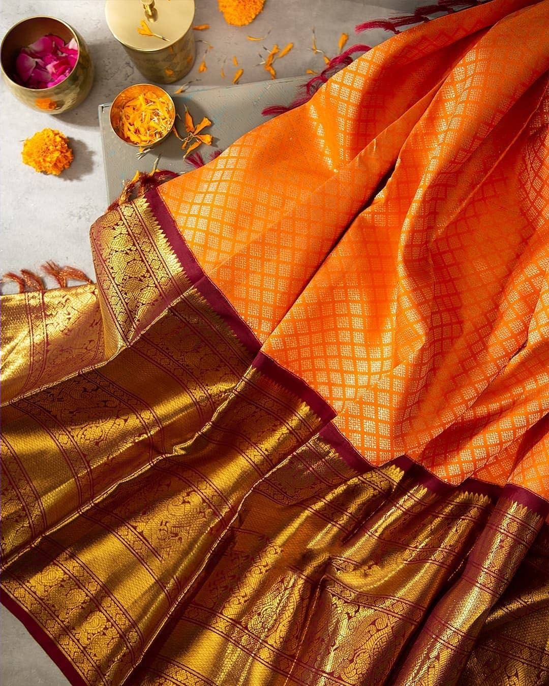 Bewitching Orange Soft Banarasi Silk Saree With Beleaguer Blouse Piece