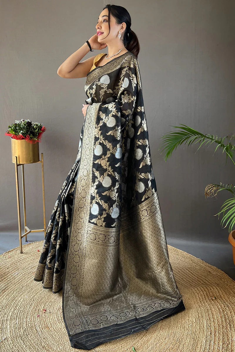 Adorning Black Soft Silk Saree With Blooming Blouse Piece