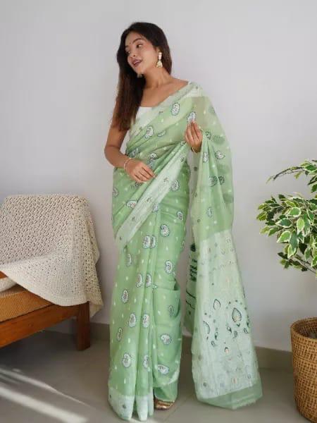 Opulent Pista Green Color Cotton Silk Saree With Blouse Piece