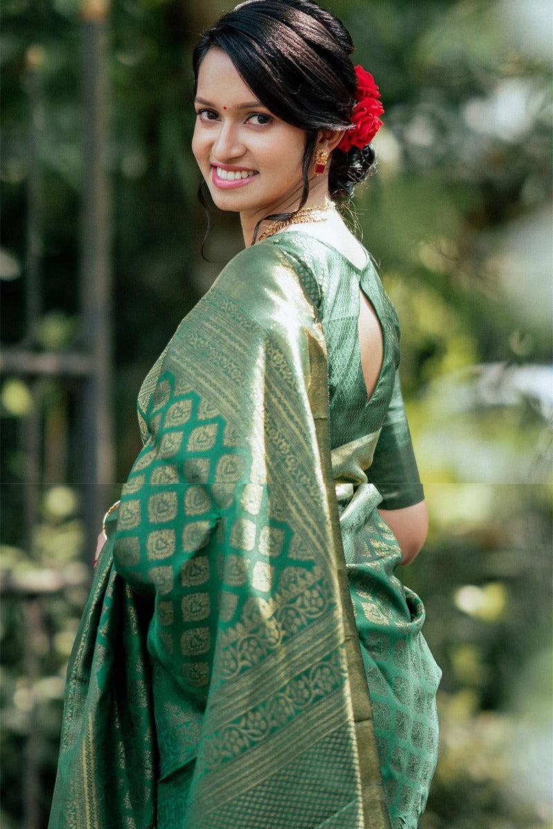 Tempting Green Soft Silk Saree With Blissful Blouse Piece