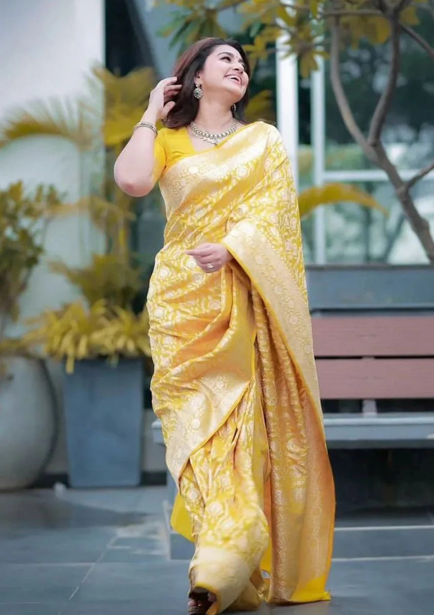 Splendiferous Yellow Soft Banarasi Silk Saree With Prominent Blouse Piece