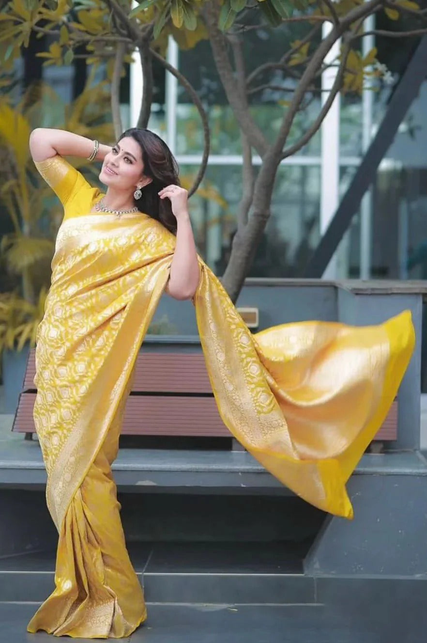 Splendiferous Yellow Soft Banarasi Silk Saree With Prominent Blouse Piece