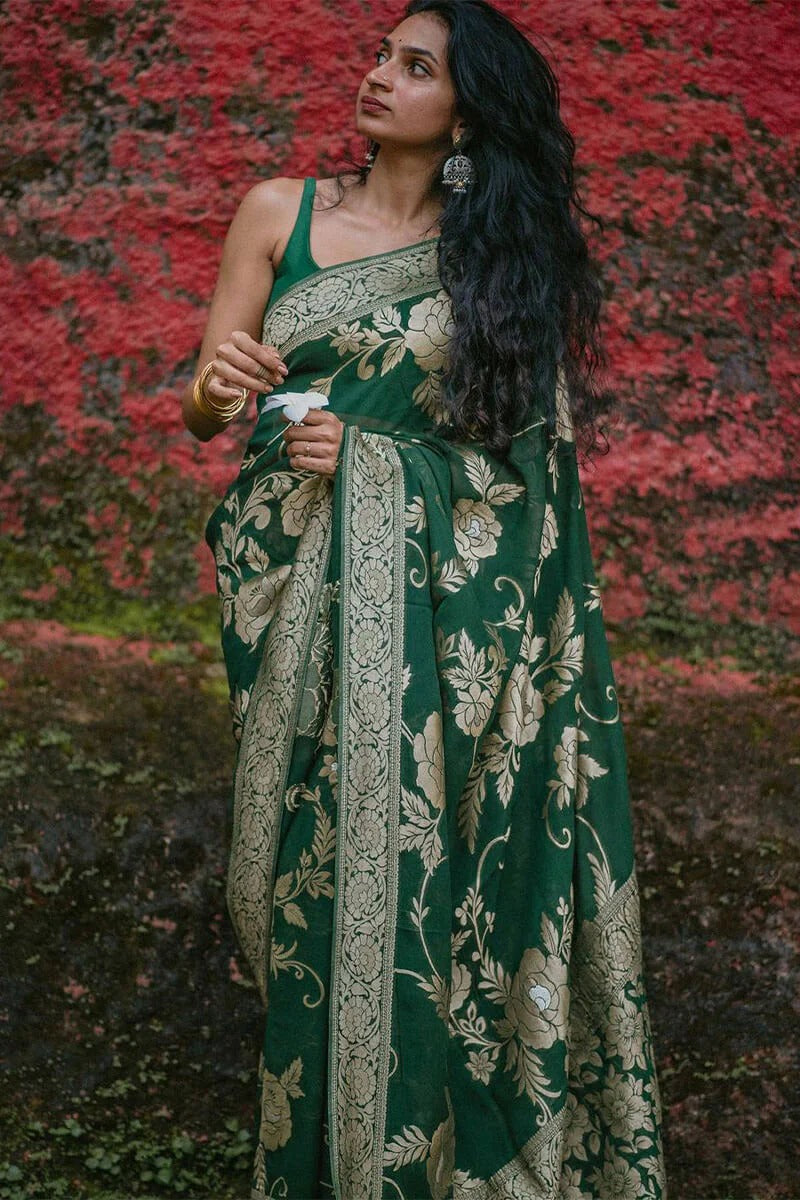 A glam Green Soft Silk Saree With Beautiful Blouse Piece