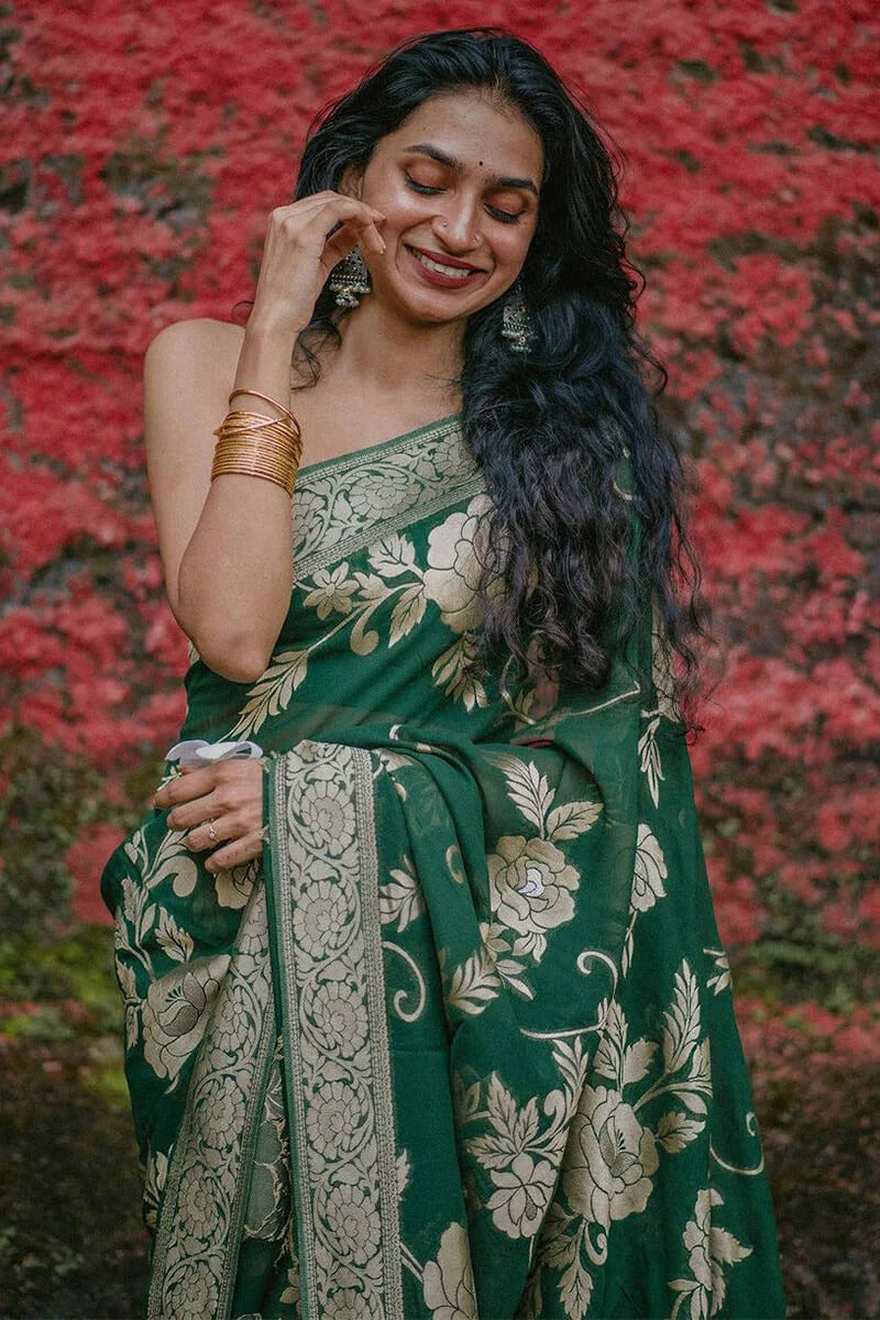 A glam Green Soft Silk Saree With Beautiful Blouse Piece