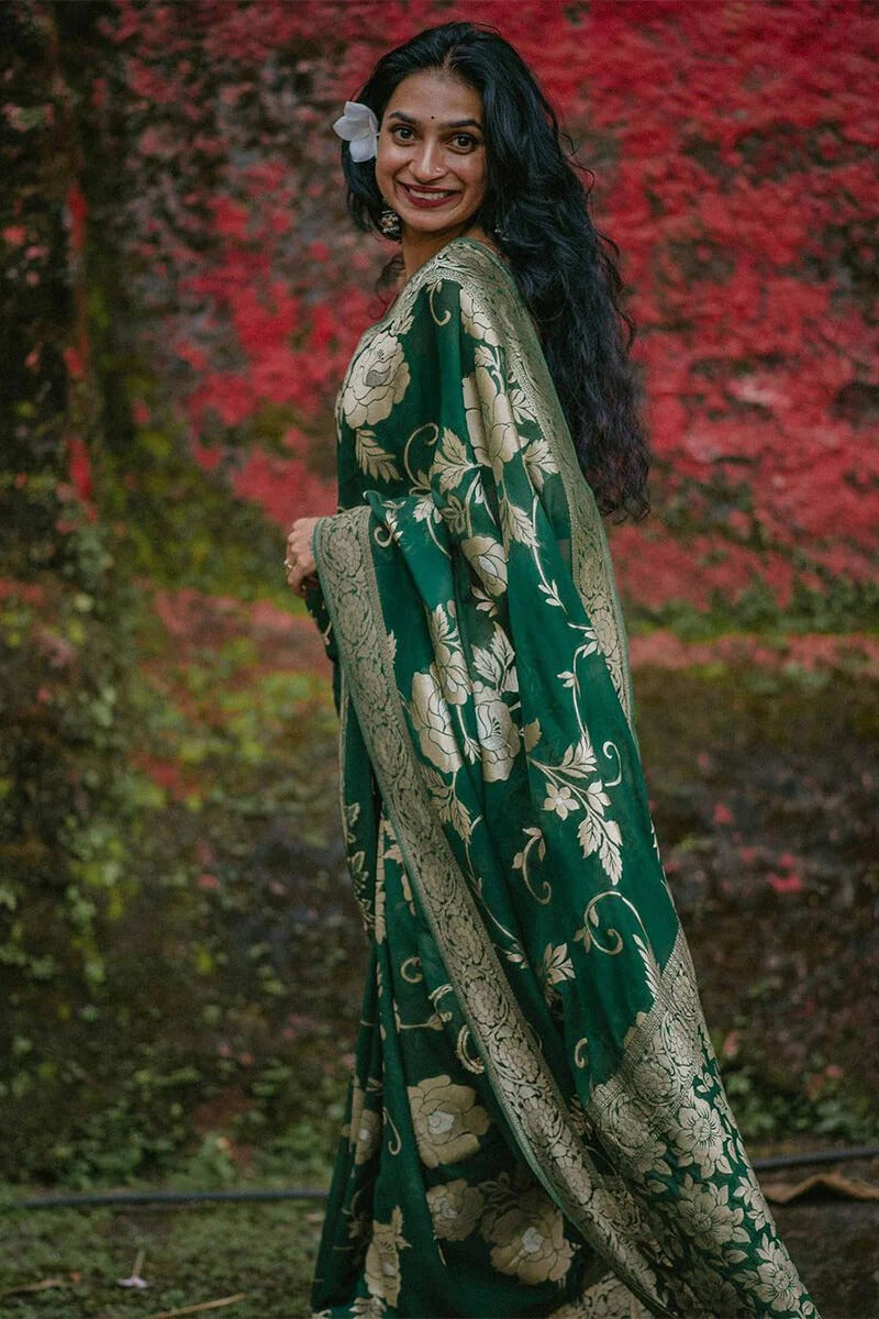 A glam Green Soft Silk Saree With Beautiful Blouse Piece