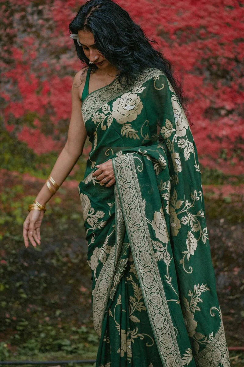 A glam Green Soft Silk Saree With Beautiful Blouse Piece