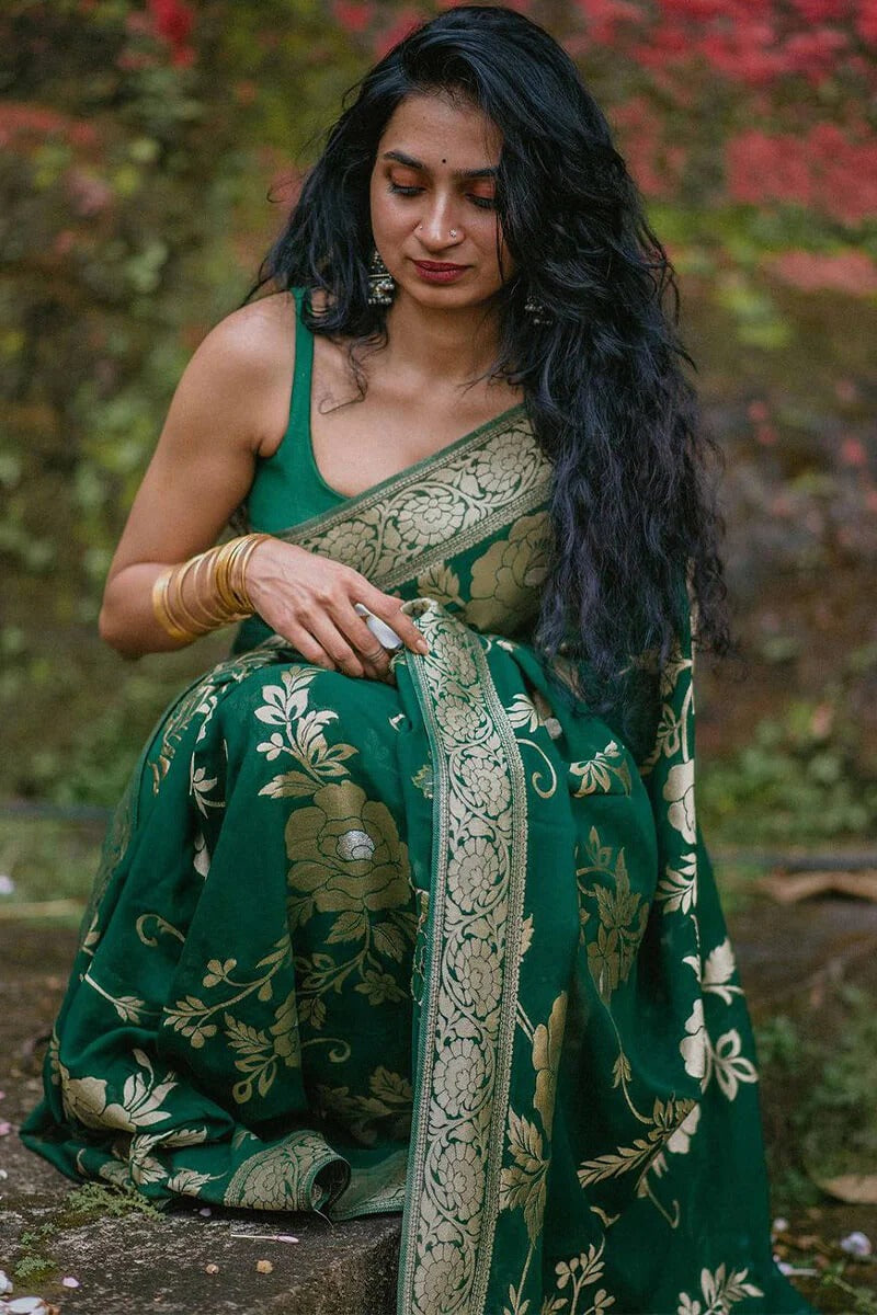 A glam Green Soft Silk Saree With Beautiful Blouse Piece