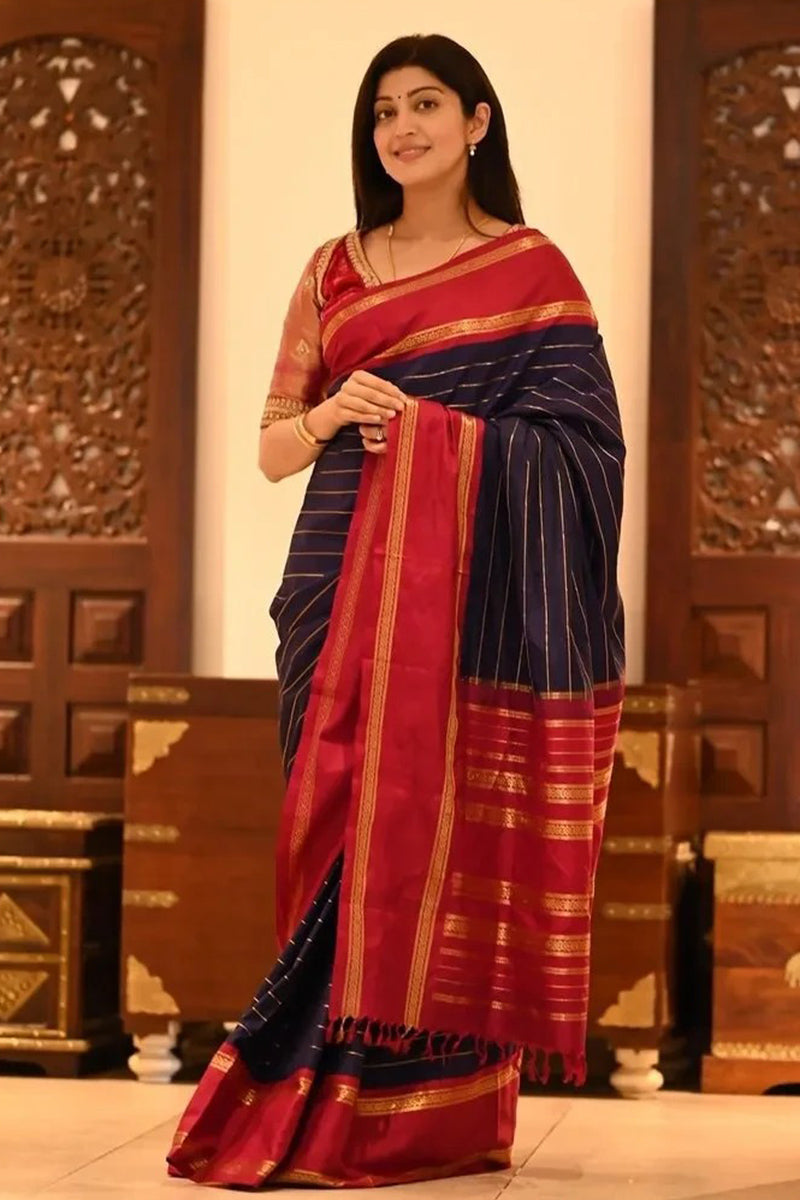 Eye-catching Navy Blue Soft Silk Saree With Sumptuous Blouse Piece