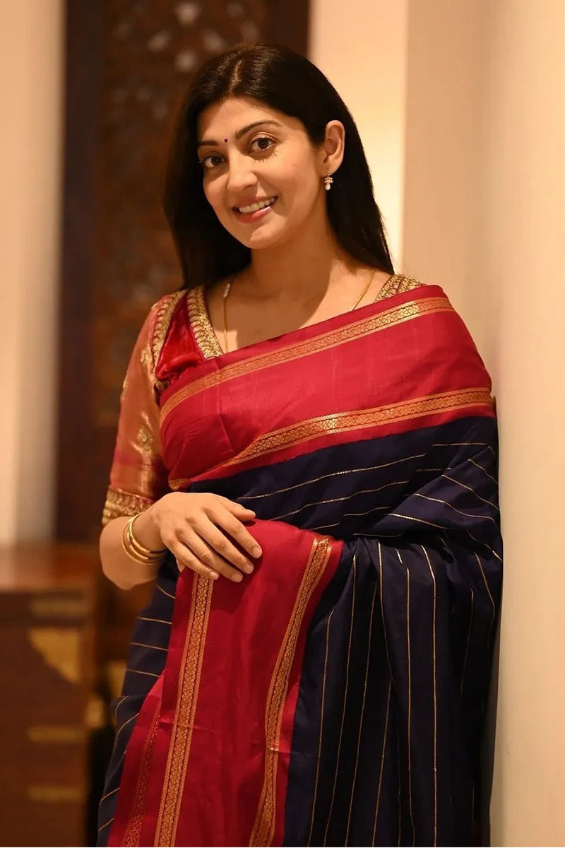 Eye-catching Navy Blue Soft Silk Saree With Sumptuous Blouse Piece