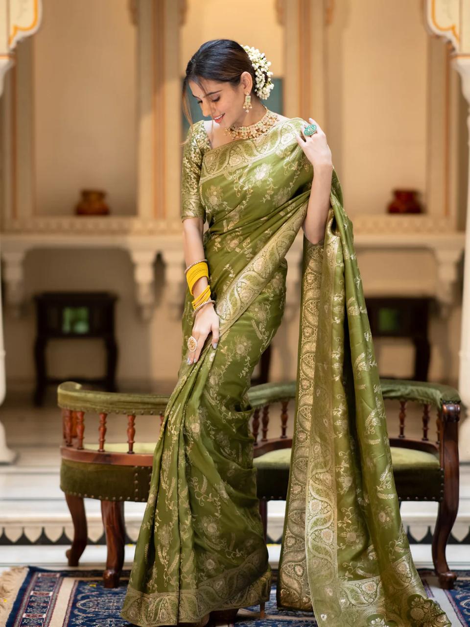 Imbrication Mehndi Color Soft Banarasi Silk Saree With Lissome Blouse Piece