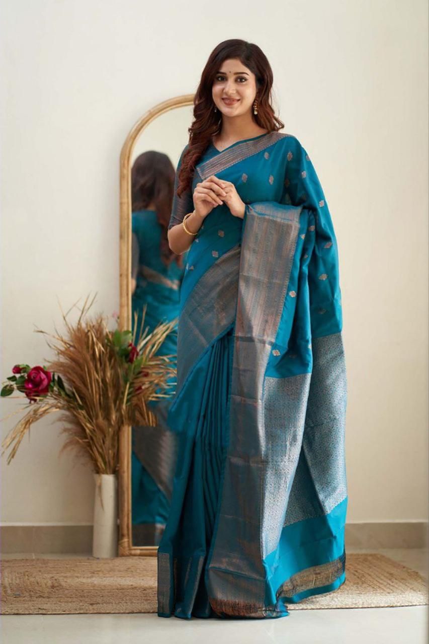 Tempting Firozi Soft Silk Saree With Scintilla Blouse Piece