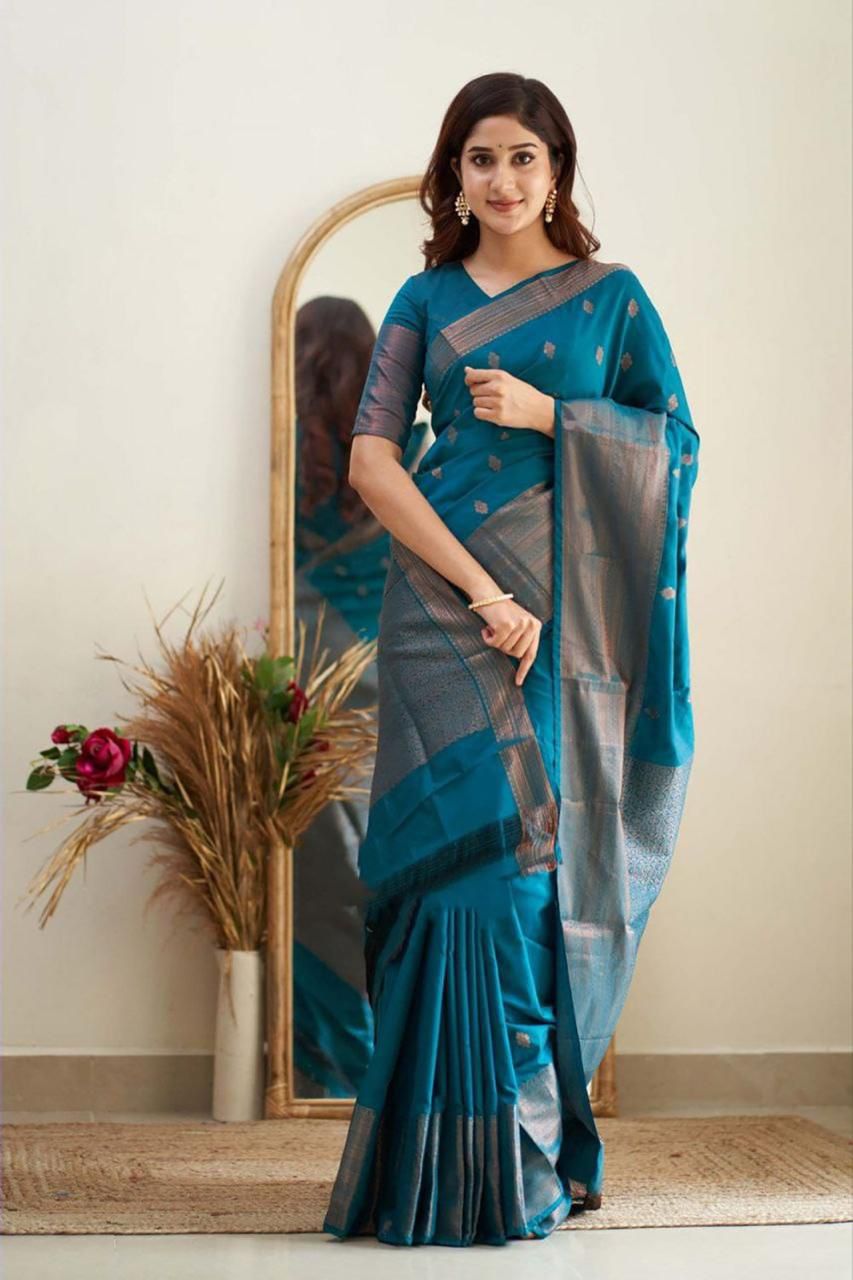 Tempting Firozi Soft Silk Saree With Scintilla Blouse Piece