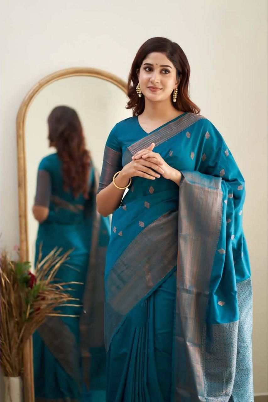 Tempting Firozi Soft Silk Saree With Scintilla Blouse Piece