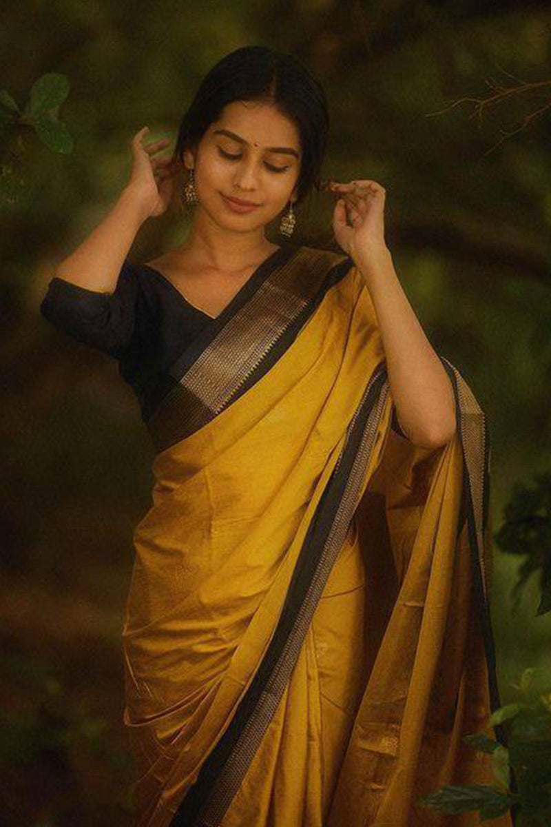 Enticing Yellow Soft Silk Saree With Blouse Piece