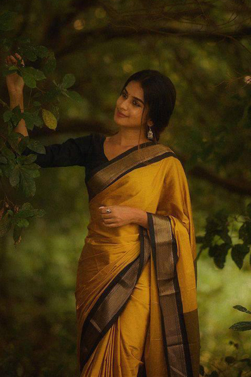 Enticing Yellow Soft Silk Saree With Blouse Piece