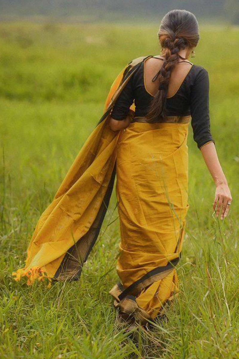 Enticing Yellow Soft Silk Saree With Blouse Piece