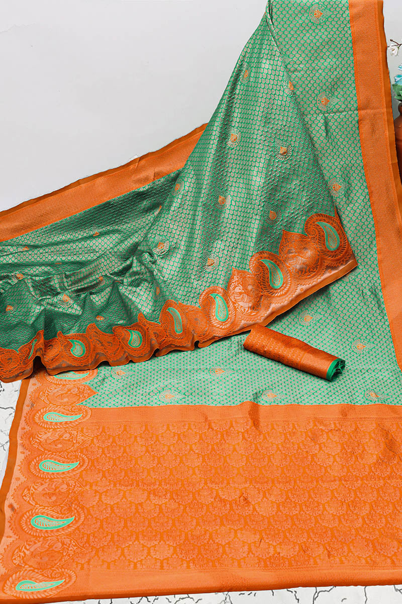 Exceptional Sea Green Soft Banarasi Silk Saree With Desiring Blouse Piece