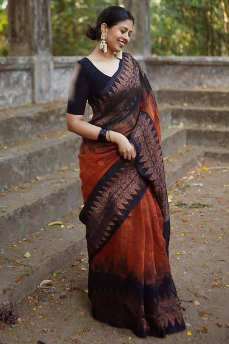 Engaging Orange Soft Silk Saree With Diaphanous Blouse Piece