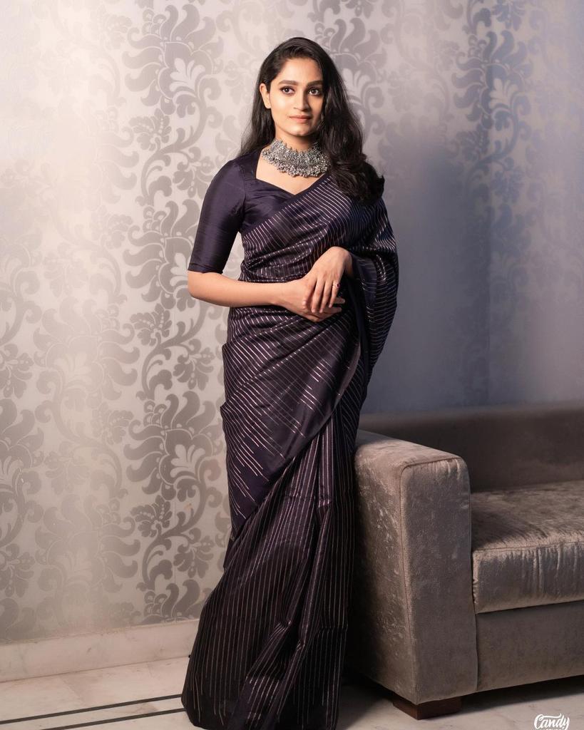 Elegant Black Soft Silk Saree With Flameboyant Blouse Piece