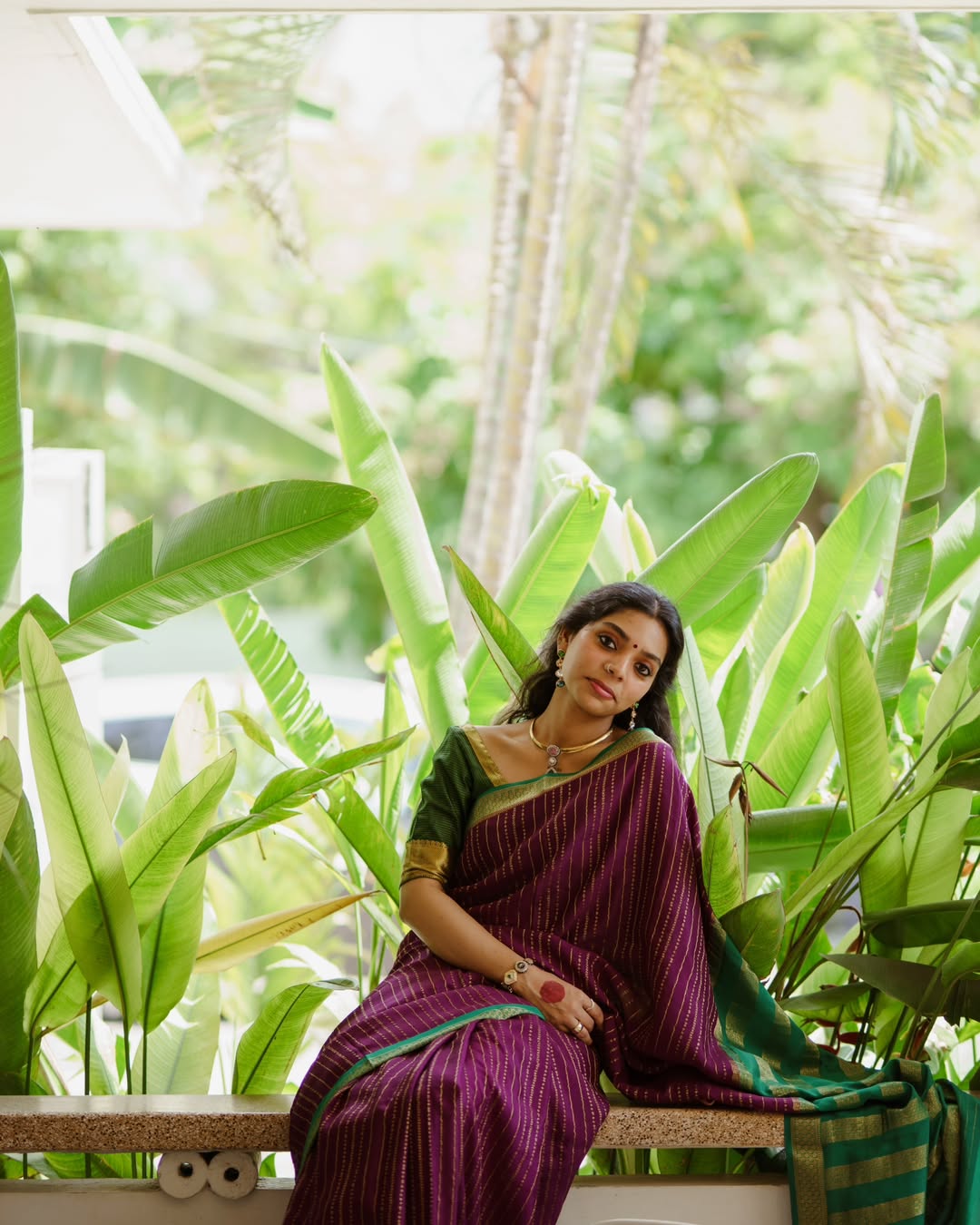 Cynosure Wine Soft Silk Saree With Enchanting Blouse Piece