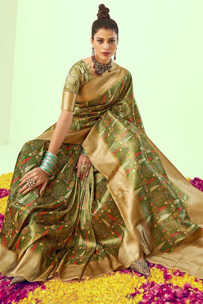 Demanding Green Soft Silk Saree With Elaborate Blouse Piece