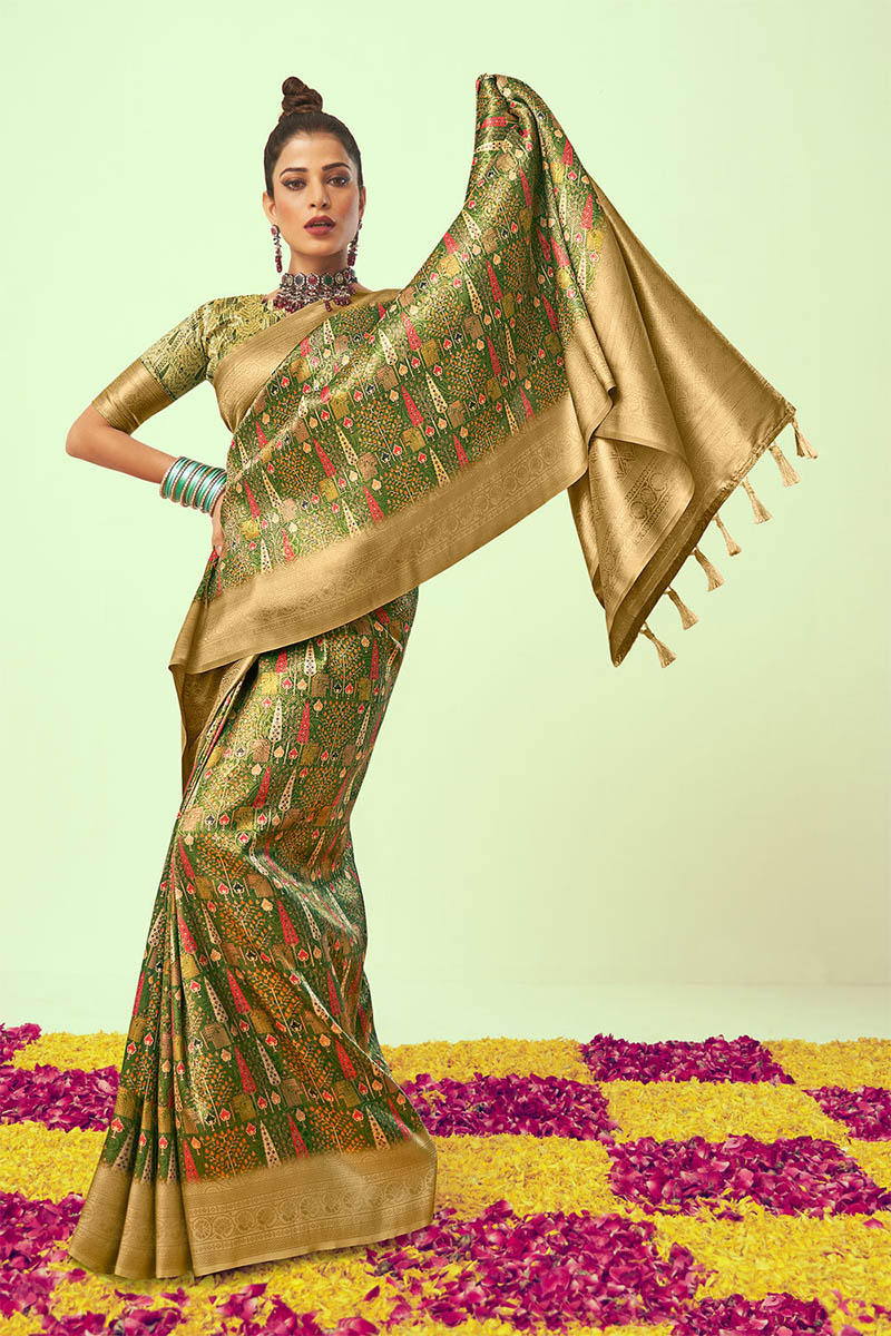 Demanding Green Soft Silk Saree With Elaborate Blouse Piece