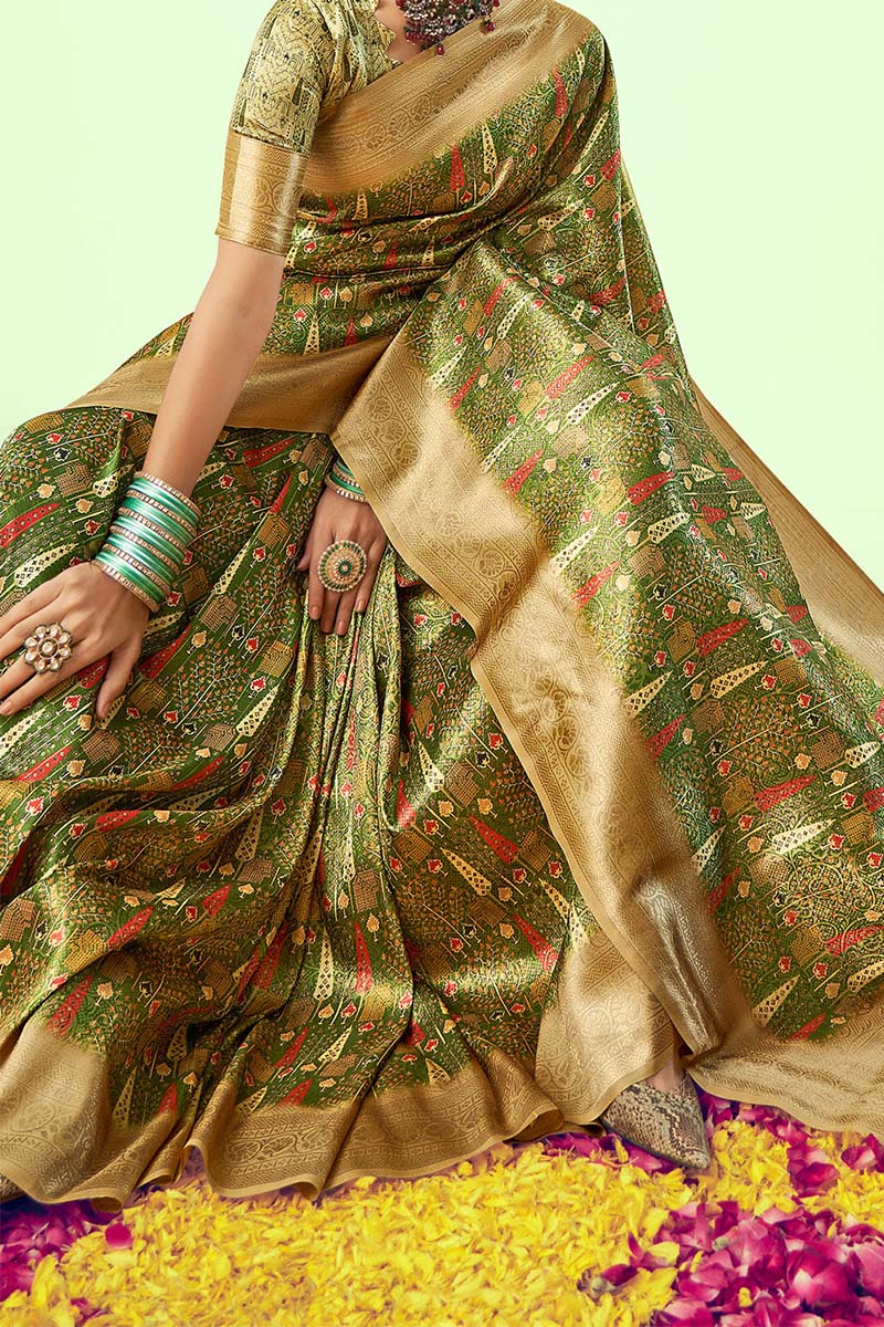 Demanding Green Soft Silk Saree With Elaborate Blouse Piece