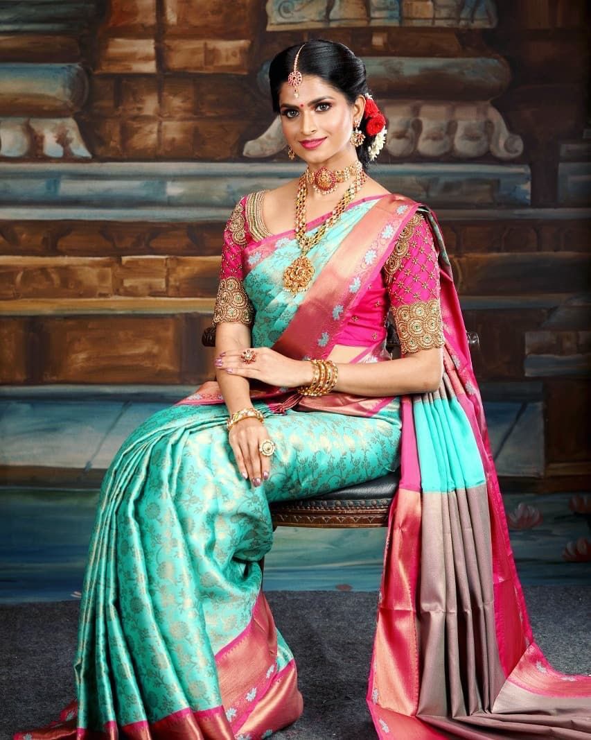 Dreamy Firozi Soft Banarasi Silk Saree With Glam Blouse Piece