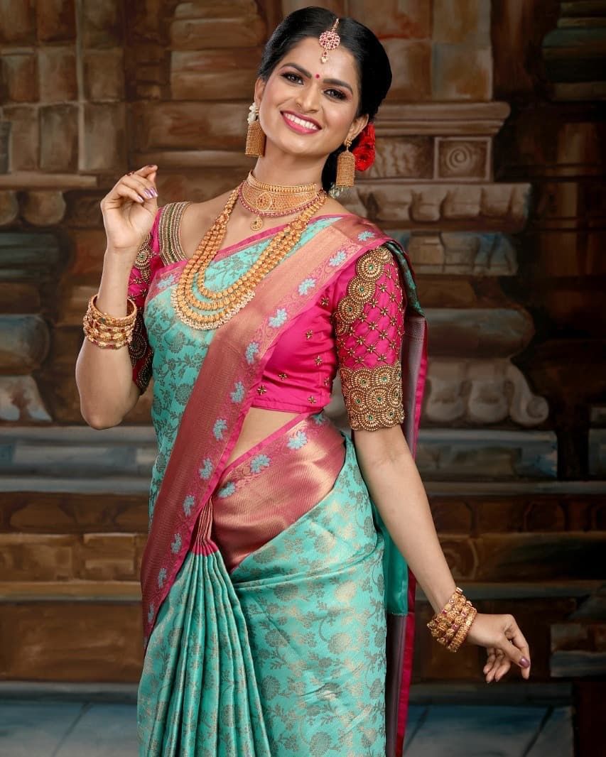 Dreamy Firozi Soft Banarasi Silk Saree With Glam Blouse Piece