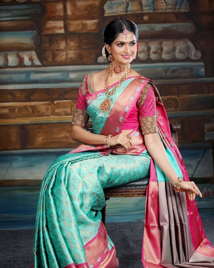 Dreamy Firozi Soft Banarasi Silk Saree With Glam Blouse Piece