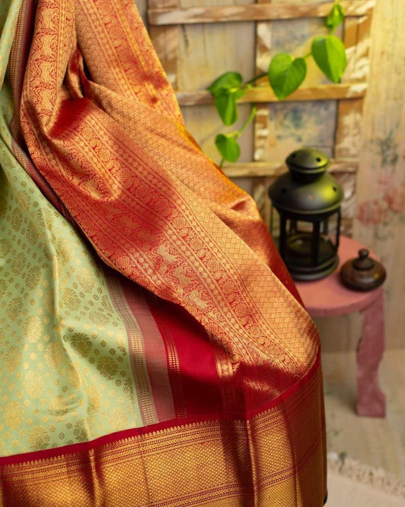 Dazzling Pista Soft Banarasi Silk Saree With Transcendent Blouse Piece