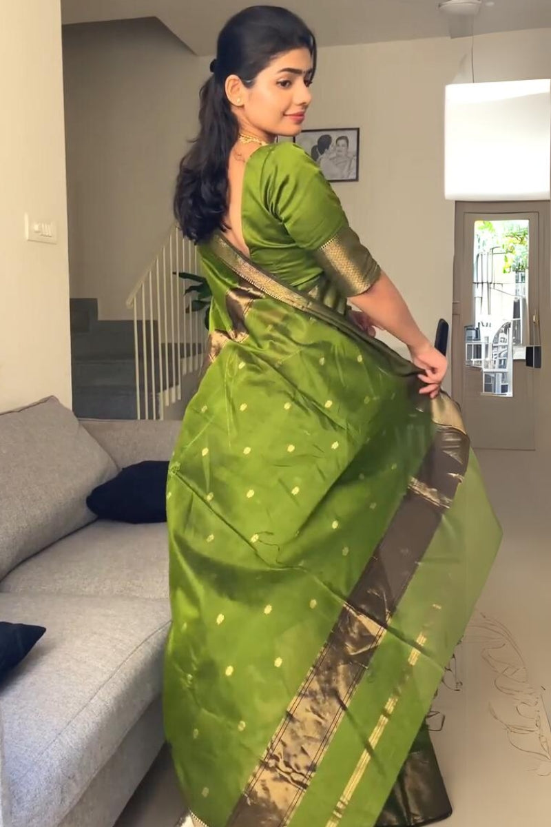 Invaluable Green Cotton Silk Saree With Precious Blouse Piece