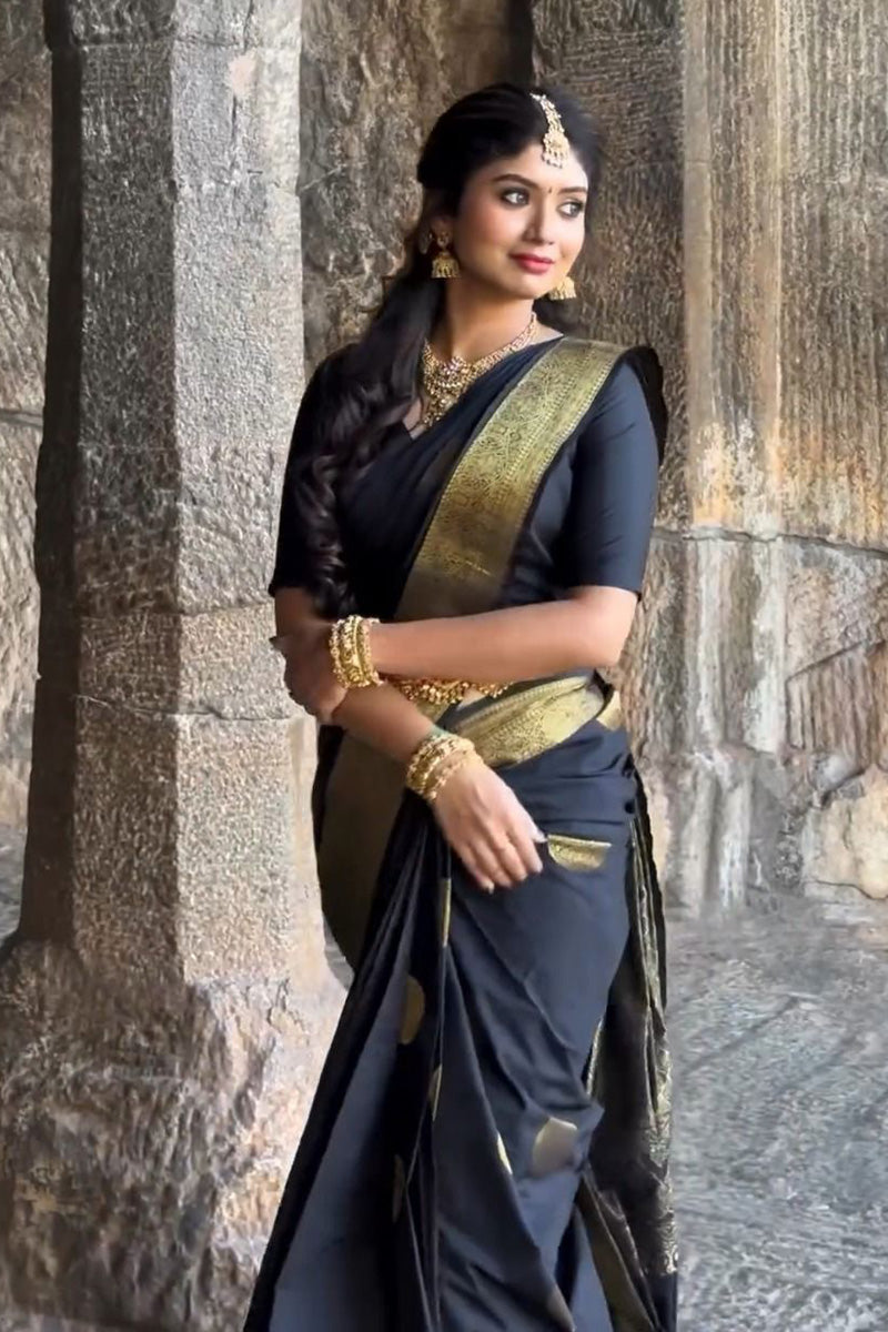 Sempiternal Black Soft Silk Saree With Bewitching Blouse Piece