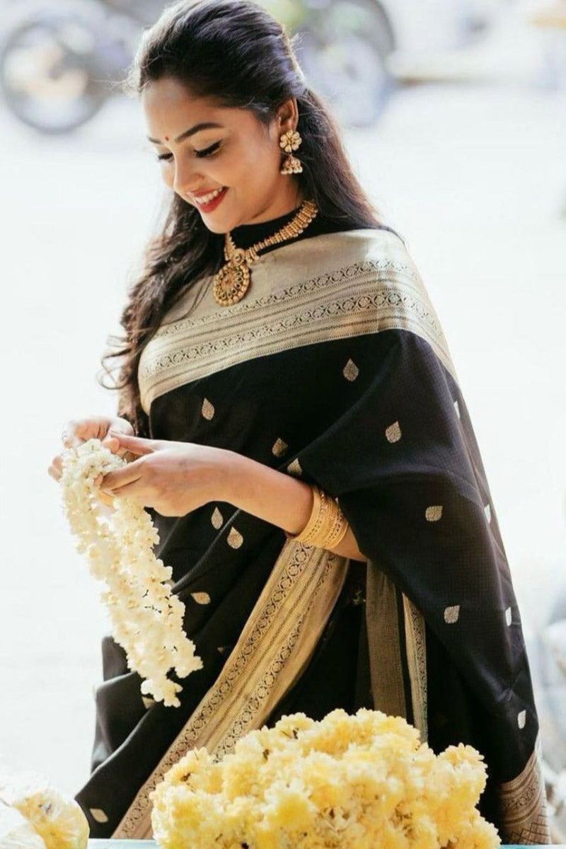 Stunner Black Soft Silk Saree With Ephemeral Blouse Piece