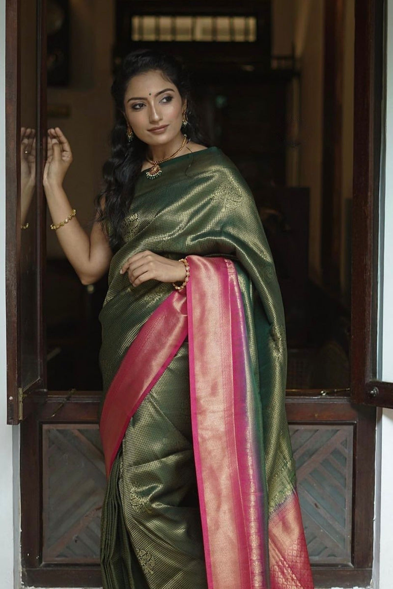 Charming Green Soft Silk Saree With Delectable Blouse Piece