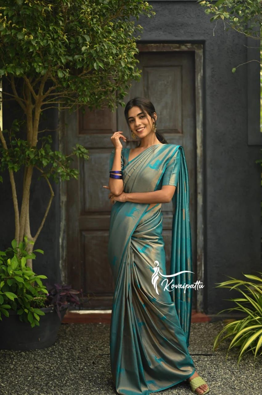 Glowing Rama Color Soft Silk Saree With Blouse Piece