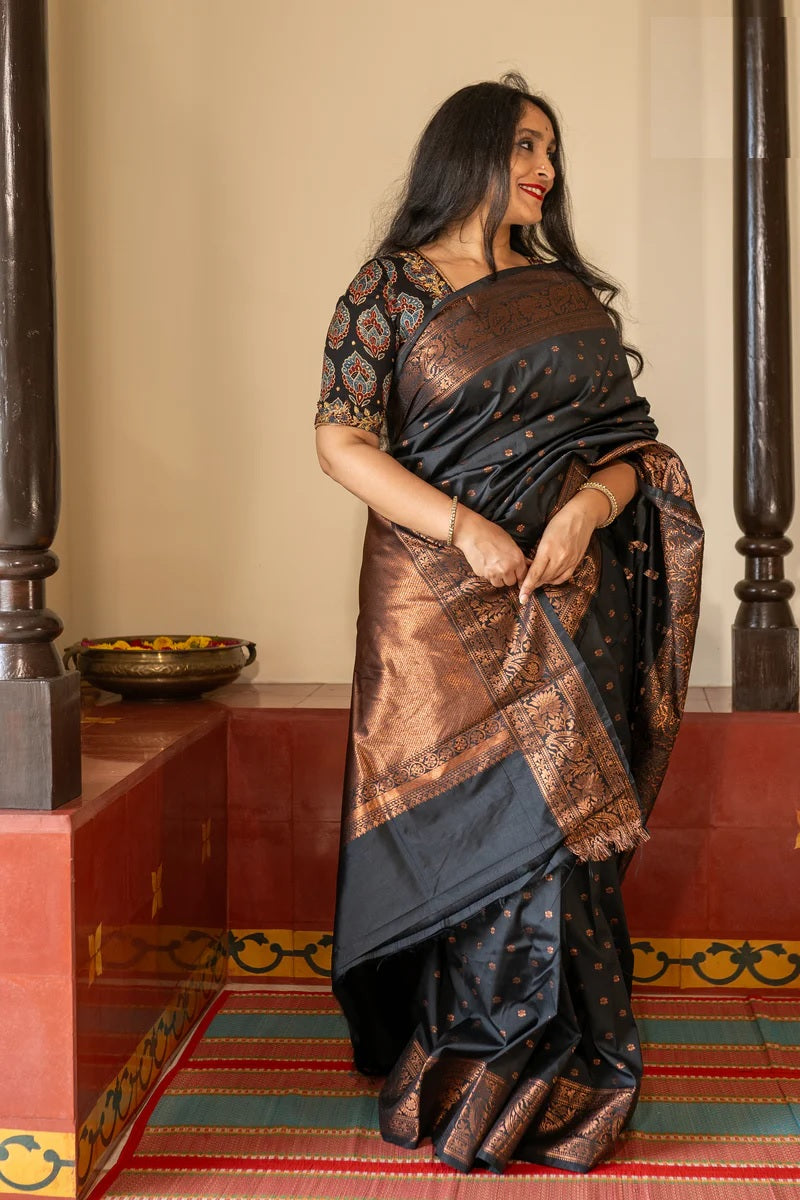 Tremendous Black Soft Silk Saree With Adoring Blouse Piece