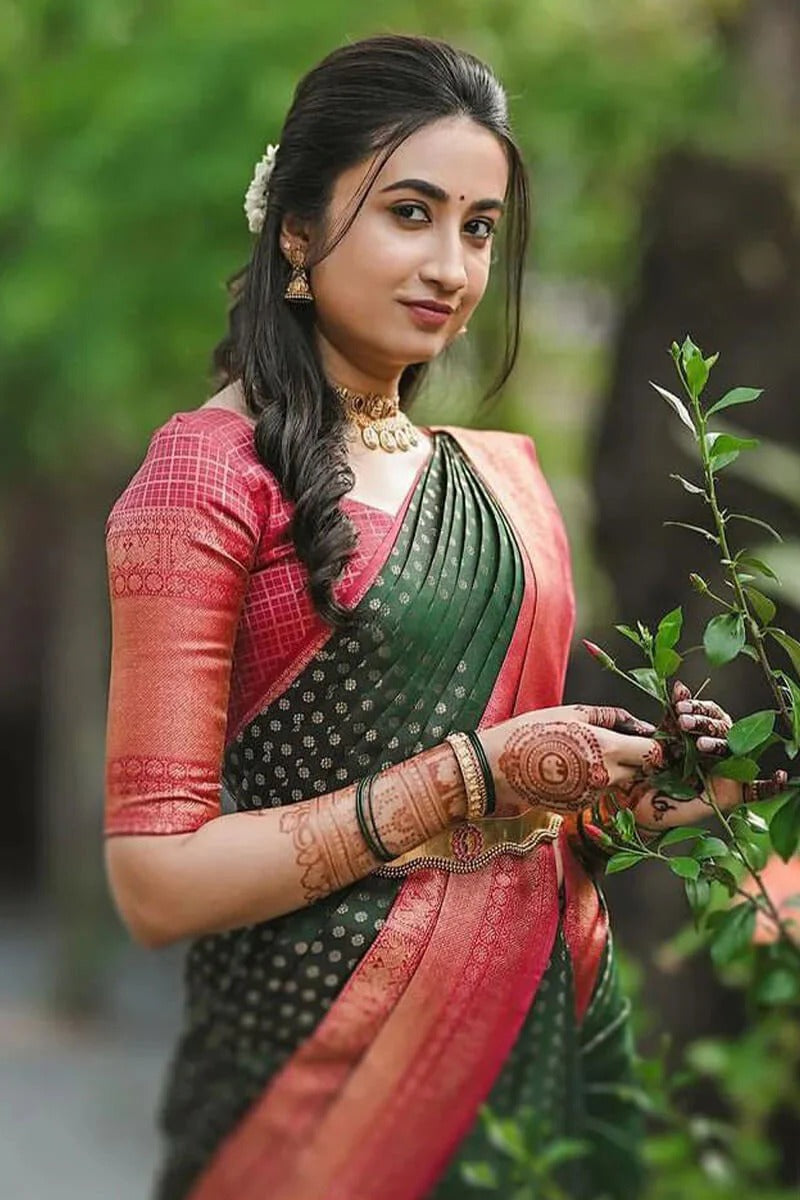 Delectable Green Soft Silk Saree With Effervescent Blouse Piece