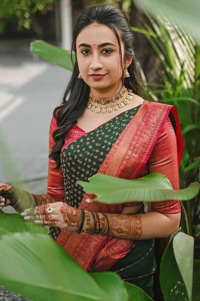 Delectable Green Soft Silk Saree With Effervescent Blouse Piece