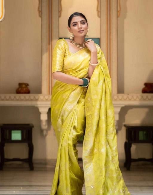 Exuberant Yellow Soft Silk Saree With Prettiest Blouse Piece